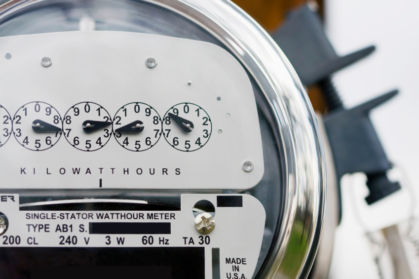 Close-up of an electric meter with lock in background.